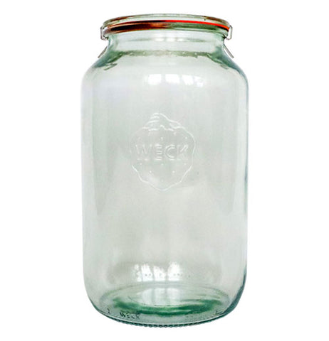 A glass jar with the Weck logo engraved on it.