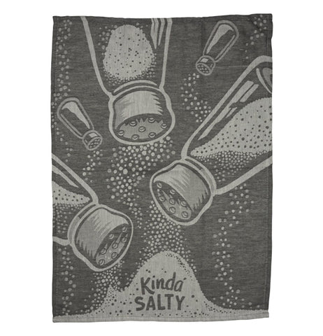 This dark gray dish towel has lighter gray images of salt being poured from salt shakers. In the middle of the salt pile at the bottom are the words, "Kinda Salty" in gray lettering.