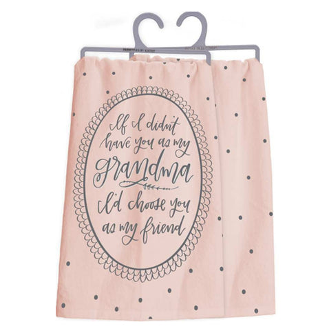 A front view and a back view of the same towel. The front has a pink polka dot design with the text that reads "If I Didn't Have You As My Grandma - I'd Chose You As My Friend" in a vintage oval border design. The back is pink with black polka dots. 