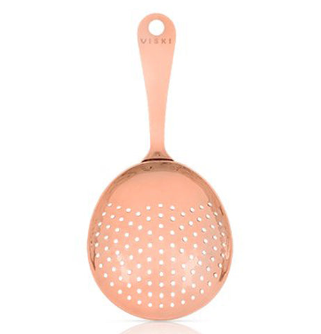 This drink strainer is made of copper with a hole at the end of its handle for hanging on a wall. The word, "Viski" is spelled below the hole in brown lettering.