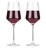 Two of the wine glasses are shown filled with red wine. 