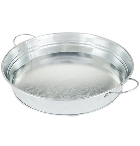 This is a circular serving tray, made of galvanized metal, and with two metal handles on either side to hold it up.