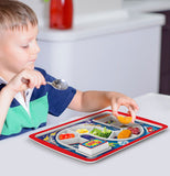 The child eating food on a Superhero Dinner Plate on a table.