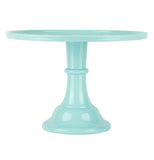 This is a mint colored melamine stand for holding cake.