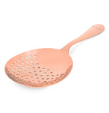 The copper drink strainer is shown from a curved frontal view-point.