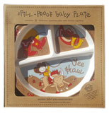The baby plate with cowboys on it is shown within its cardboard packaging.