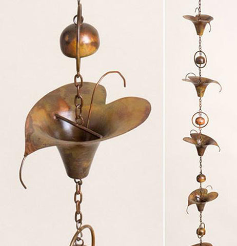 Close up and full view of calla lily flamed garden ornament.