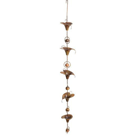 Flamed calla lily garden ornament with copper bells in between each lily.