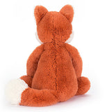 This image of the plush orange fox is shown from the rear.