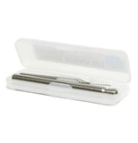 The clear plastic case is open to reveal the silver brush and straw lying next to it.