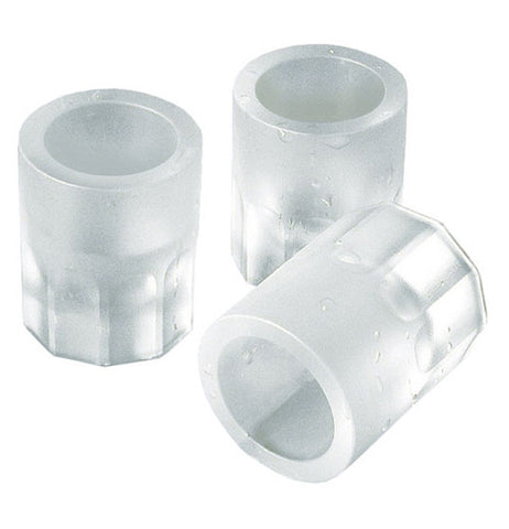 Three shot glass shaped ice cubes.