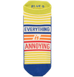 yellow stripped sock with a blue sole and words written on the middle. the words are "Everything is annoying" with everything in blue, is in orange and annoying in red.