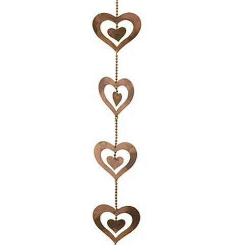 This string of hearts are made of steel with copper finish sprayed with gold paint. There is a heart within another heart.