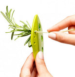 Two hands use a LooseLleaf kale and greens stripper to strip rosemary from the stem.