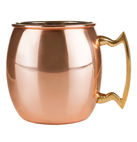 Mug that is copper and has a handle. 