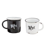 Two mugs are shown; one is black with a white interior and the word, "Mr." written on it in white lettering. The other is white with a black rim and the word, "Mrs." written on it in black lettering.