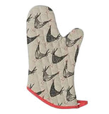 This tan oven mitt has a red edge with black chickens adorning it.  This brown oven mitt has a red trim with black chickens adorning it.