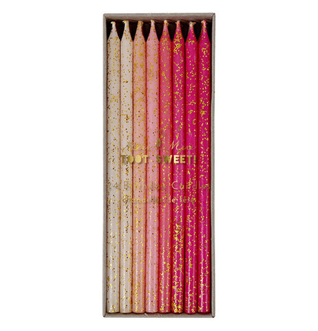 Set of 12 birthday candles in multi-pinks and whites.