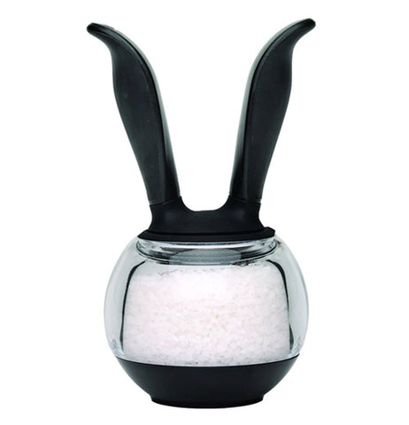 Saltball Grinders. This sea salt ball grinder has a black rubber bottom piece. The container part is clear, the handles are black and are meant to grind the sea salt.