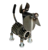 A dog made out of metal and gears is angled facing the right corner.
