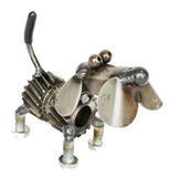 A basset hound made out of scrap metal and gears faces the right corner.