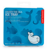 The blue ice tray with the different ocean animal stencils is shown in its packaging.