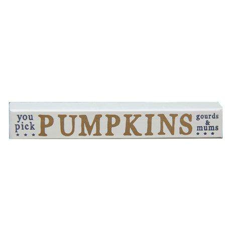 This long, thin white wooden box has the words, "You pick pumpkins gourds & mums" in black and gold lettering written across it.