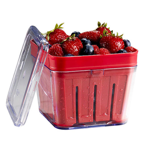 Berry basket with lid open and filled with berries.