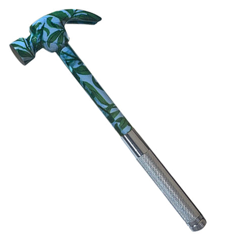 This multi-tool showing just the hammer has a blue and green leaf and sky design.