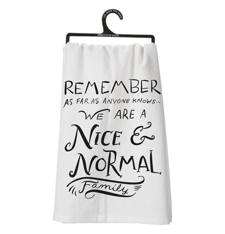 A cotton dish towel with black text on it. Any "nice and normal" family would like to have this dishtowel.