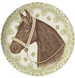 A green coaster with a horse in the middle.