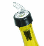 The plastic spout is shown attached to a liquor bottle.