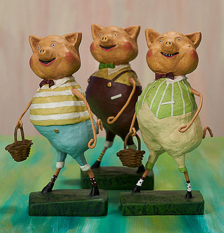 The Three Little Pig figurines standing together on the pink and green background