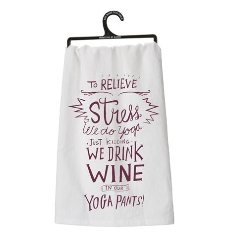 This Dish Towel has purple words with a white background and is hanging on a hanger.
