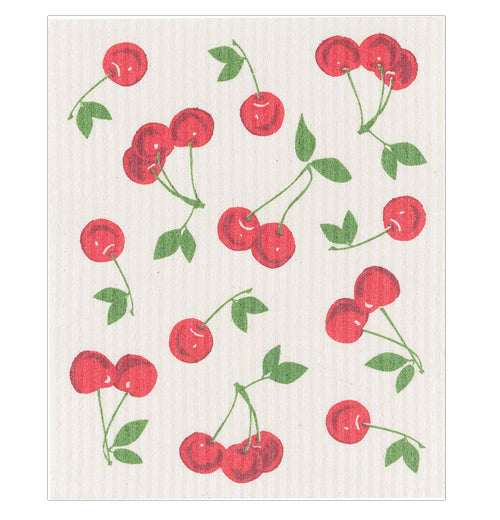 This white dishcloth has a design of red cherries covering it.