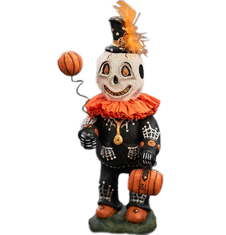 the country doctor is a white pumpkin scorecrow figurine with an orange medical bag and a Skelton doctors robe with a golden stethoscope.
