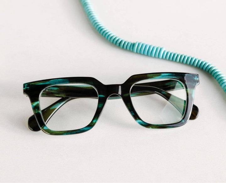 Page (Blue Light): Teal Horn / Reading / 2.50