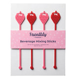A set of plastic drink stirrers with a nub on the bottom to help you stir and a strawberry at the top for easy gripping. They are shown in their packaging. Two of the stir sticks are pink while the other two are red.