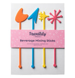 A set of plastic drink stirrers with a nub on the bottom to help you stir and each comes with a unique shapes top. From left to right, they are shaped like an orange oraganically shaped half circle, a blue traingle, yellow stars, and a pink asterisk. They are shown side by side in their packaging.
