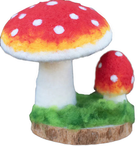 Felt Mushrooms On A Wooden Base