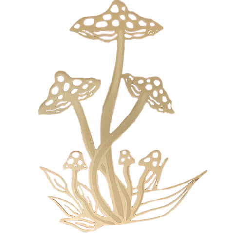 A brass bookmark is shaped like mushrooms and leaves.