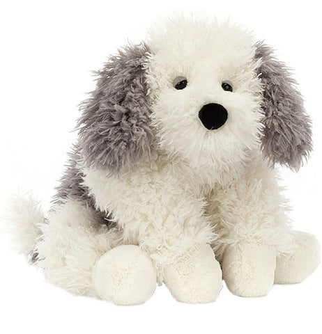 white stuffed animal sheep dog with grey ears.