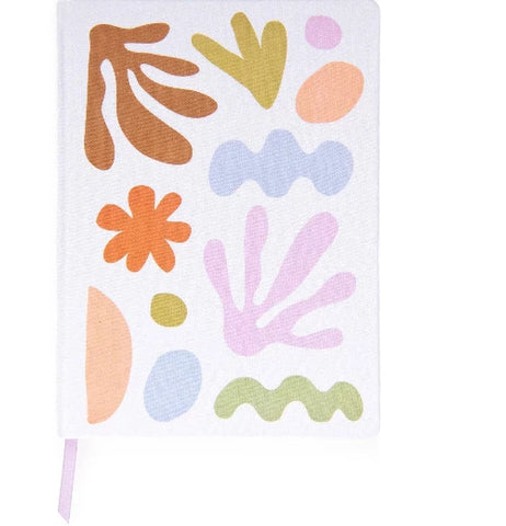 A white journal with brown, orange, green, blue, and pink organic shape designs on it.