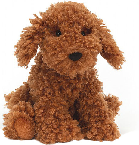 this is a fluffy and adorable stuffed dog. He is brown and shaggy with black eyes.