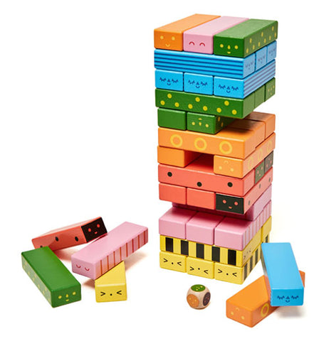 Jenga like game but the blocks are painted like bugs. Pink bug with stripes, Green bug with Spots, Yellow bumblebee bug, Lady bug, Orange bug with circles, and blue bug with stripes.