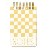 A wired pocket notebook is yellow checkered with the words "Notes" in it.