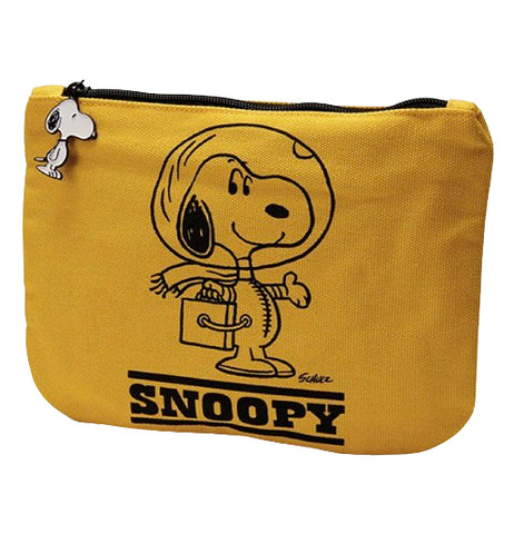Features black outline of Snoopy the dog from Charlie Brown and Snoopy series from Peanuts in an astronaut outfit with the words SNOOPY under him. The bag is dark yellow with a zipper clasp on top and a little enabled Snoopy the dog charm hanging from the zipper clasp.
