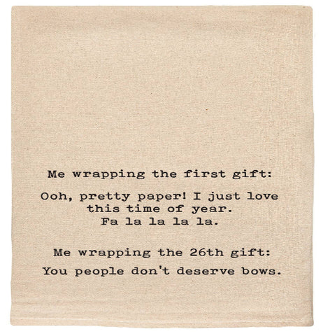 Me wrapping the first gift: Ooh pretty paper! tea towel