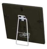 The back of the picture frame is shown with a white stand and the logo, "Primitives by Kathy" in white lettering at the bottom.