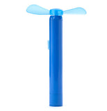 A blue, two pronged fan. There is a small button on the front.